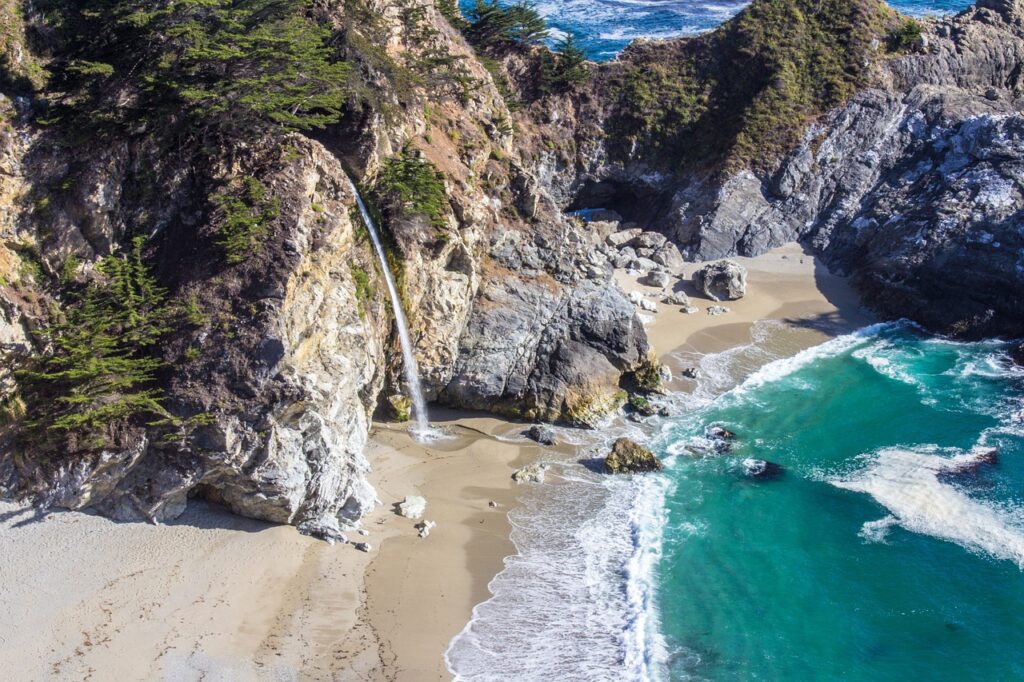 beach, waterfall, sea-1630475.jpg